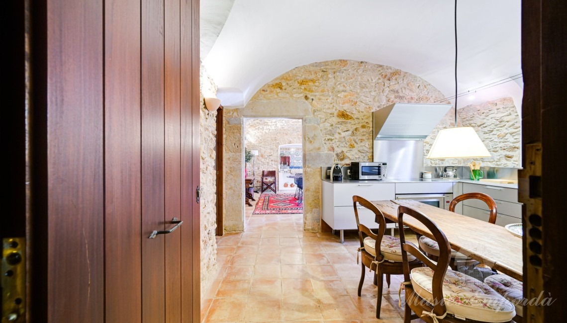 Entrada a la casa per la cuina