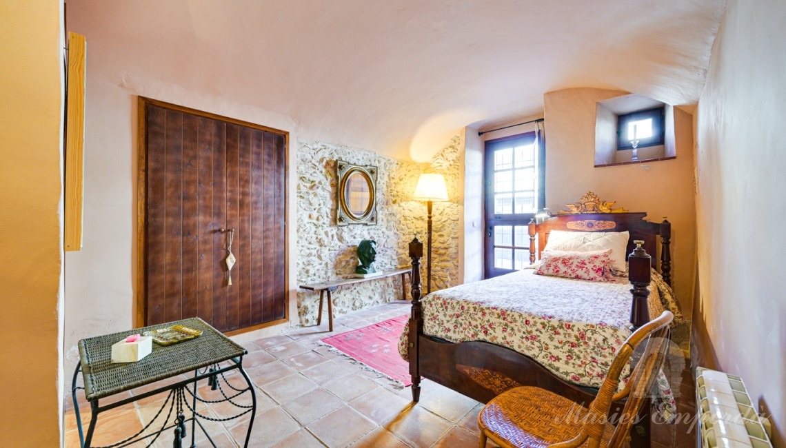 Habitació suite amb una segona entrada des del carrer posterior