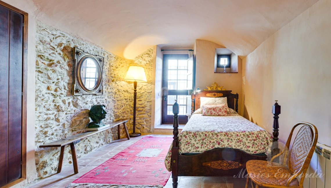 Habitació suite amb una segona entrada des del carrer posterior