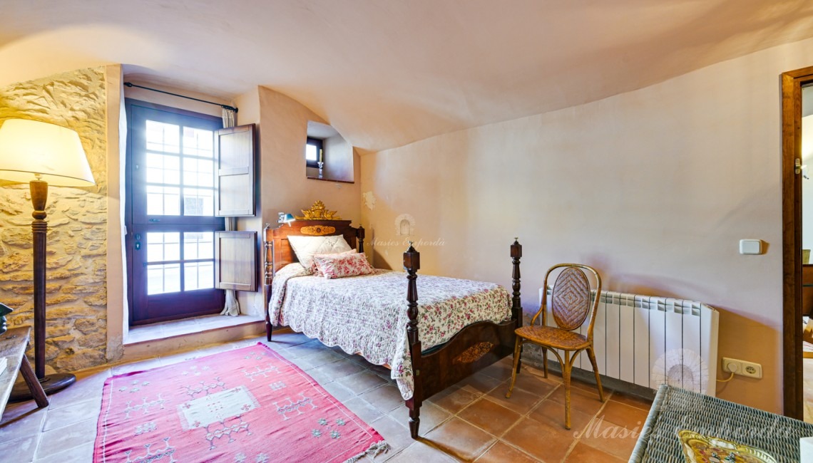 Habitació suite amb una segona entrada des del carrer posterior