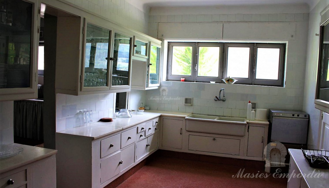 Cocina de la casa en planta junto al comedor