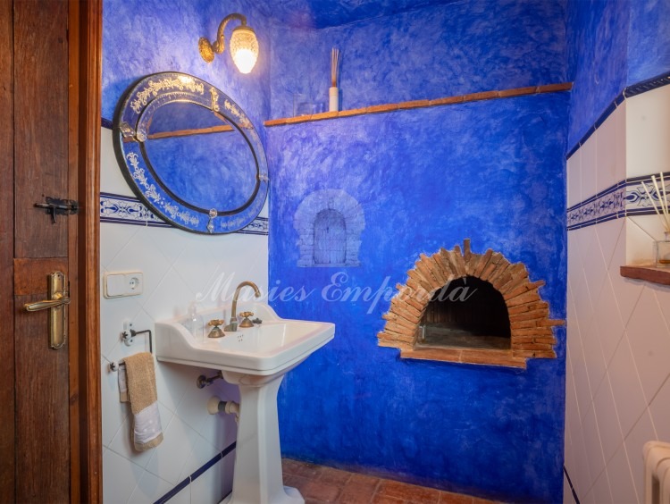 Baño de cortesía de planta 