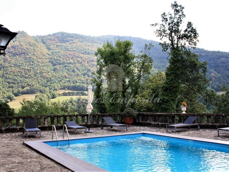 Terraza y piscina de la casa